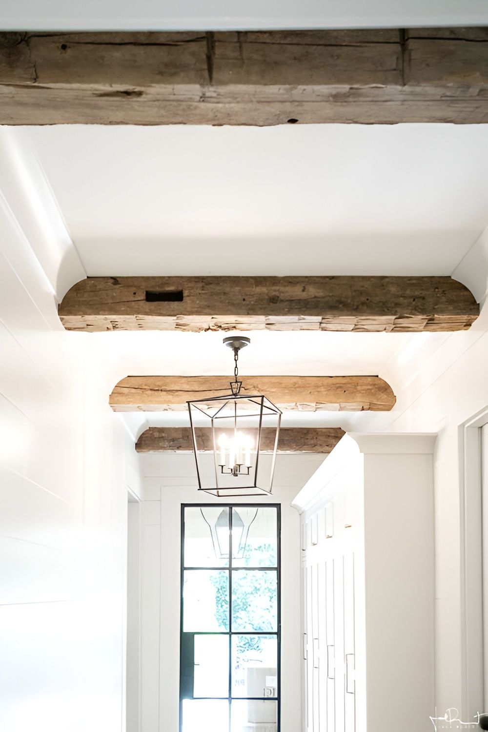 Mixed-tone reclaimed wood feature wall with weathered grey and brown boards