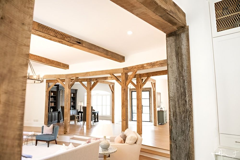 Reclaimed wood accent wall paired with modern furniture