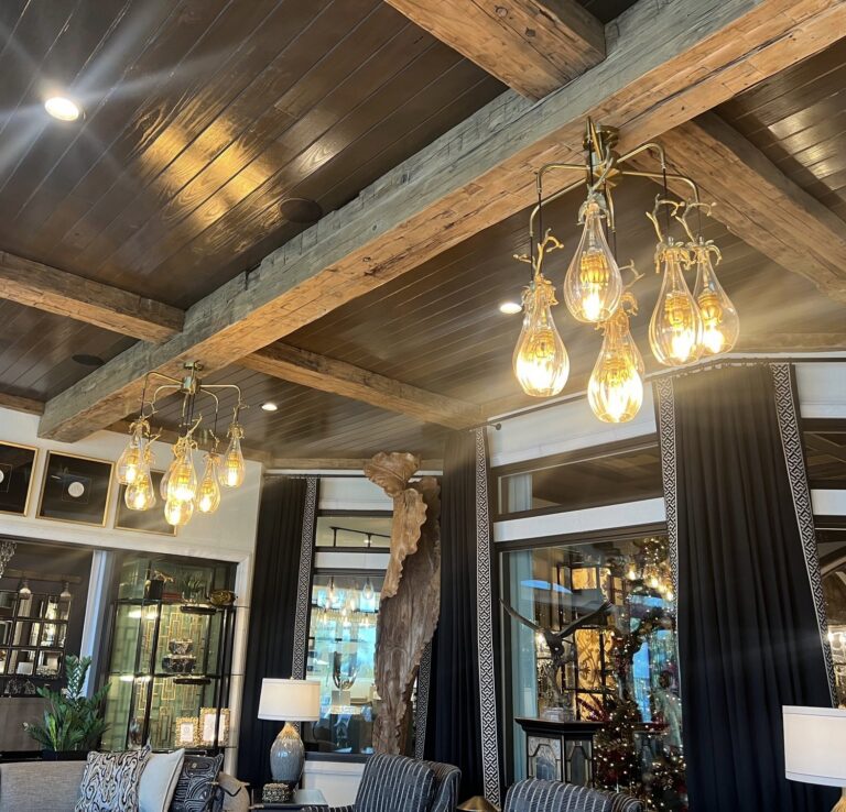 Hand hewn pine reclaimed box beams on the ceiling of a Jacksonville, Florida home