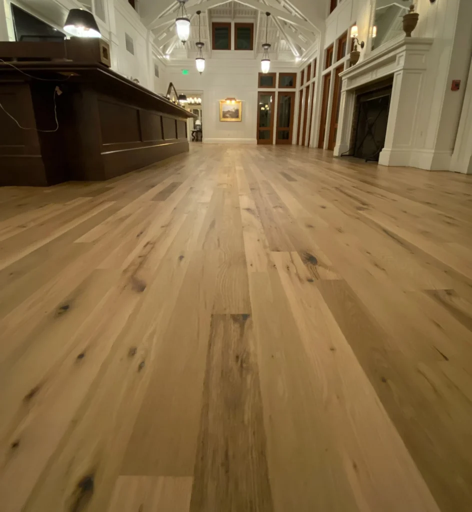 Kentucky paddock oak reclaimed flooring running down a long hallway